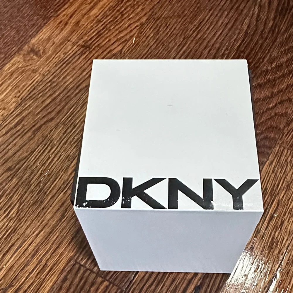 DKNY White Dial Silver-Tone Bezel Black Strap Watch